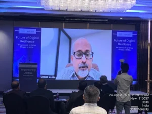 Corporate attendees seated at hybrid event powered by Cisco Webex Room Kit Plus in Delhi Aerocity